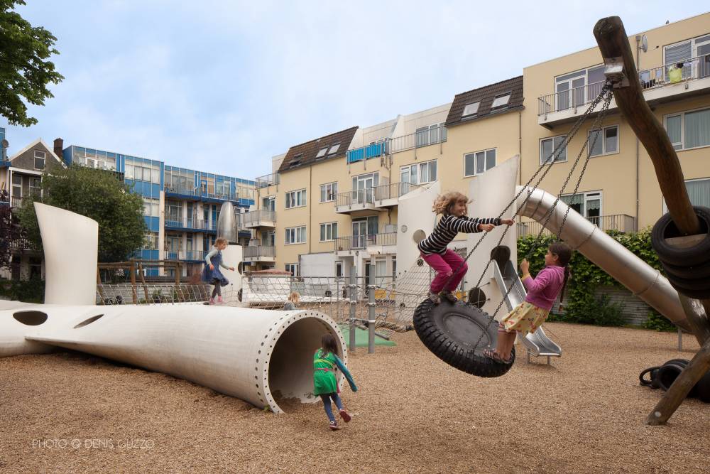 A recycled tire becomes a social net swing