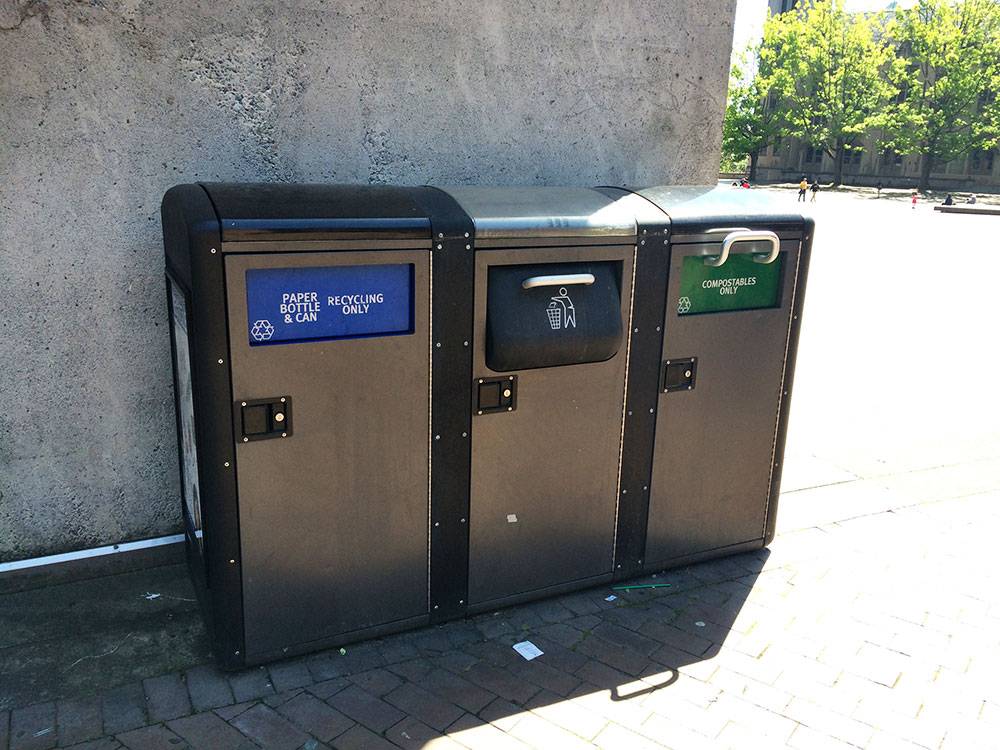 All-in-one garbage, compost, and recycling near a busy square