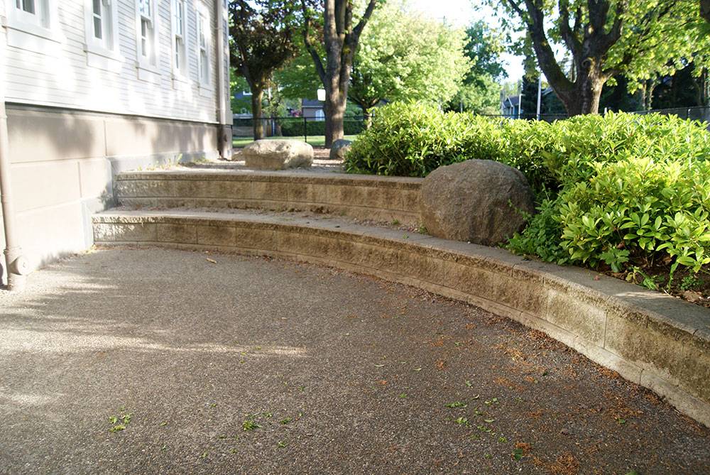 Steps in this retaining wall create a perfect place to sit
