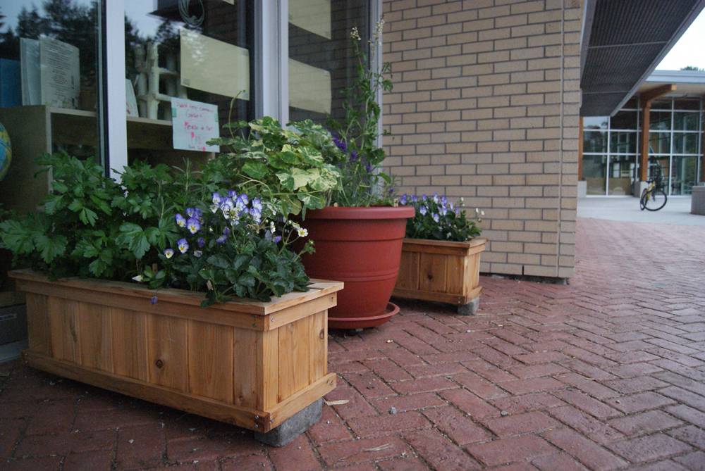 These wooden planters can easily be moved each season