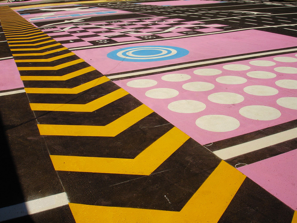 Colourful painted asphalt that suggests different play possibilities
