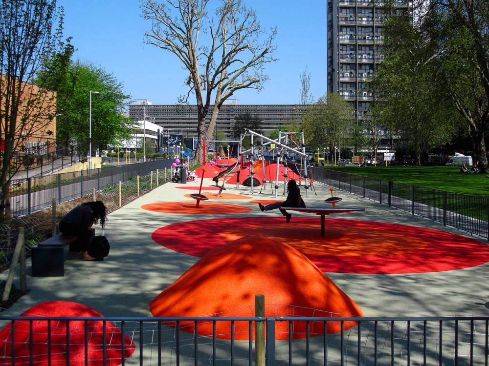 Play area with bright poured rubber mounds