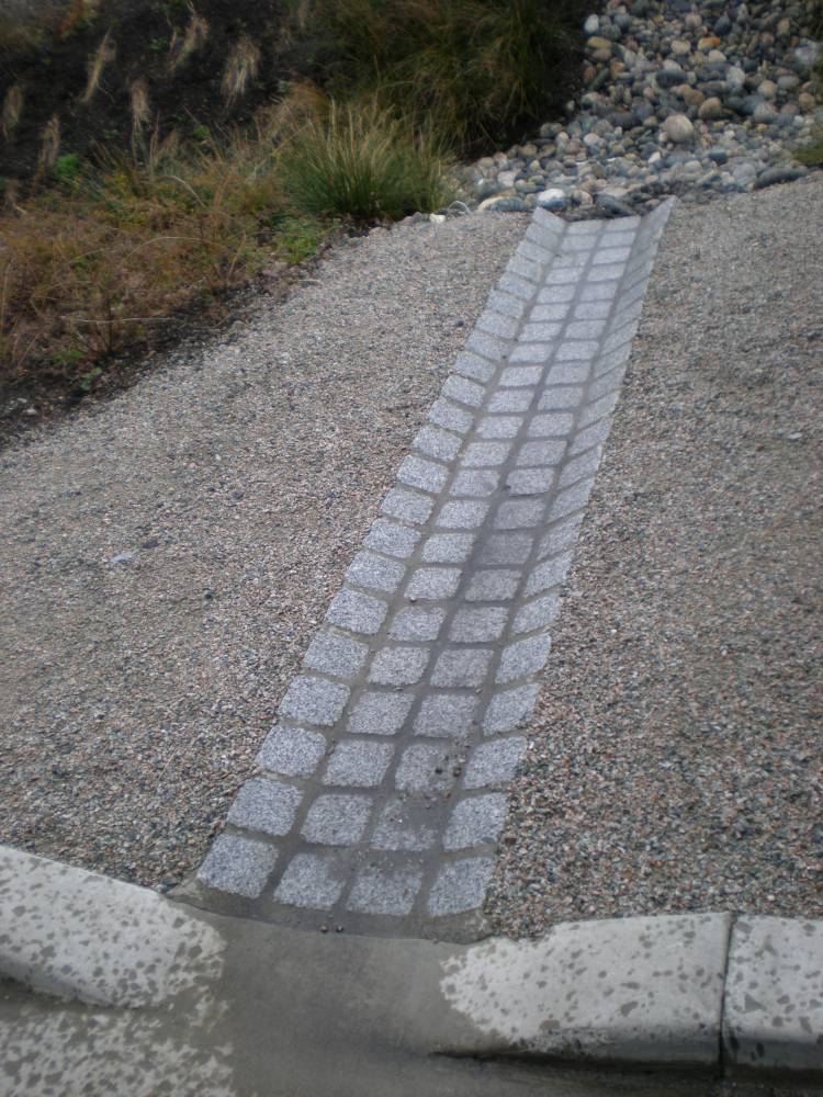 Rain channel made up of stone pavers in Olympic Village