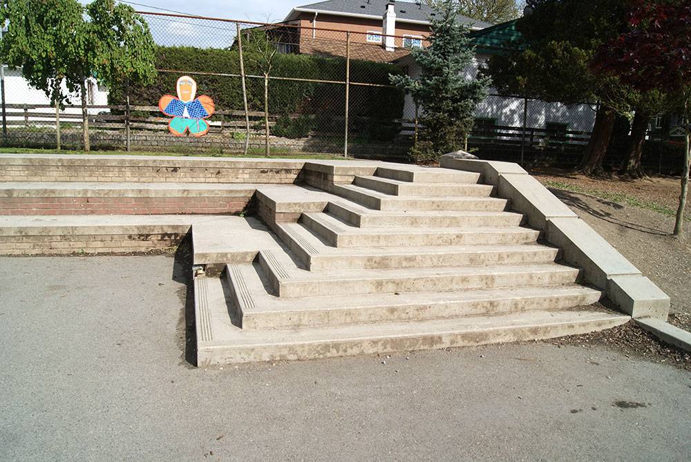 Child-sized stairs lead to the top of this outdoor classroom amphitheatre