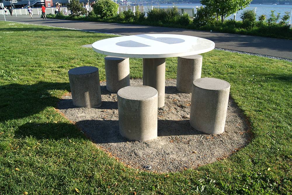 Seating for five made of durable metal and concrete