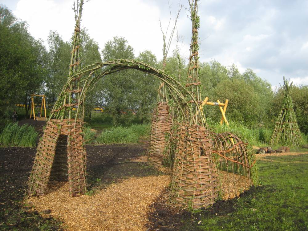 Live branches woven into an arch in Amsterdam