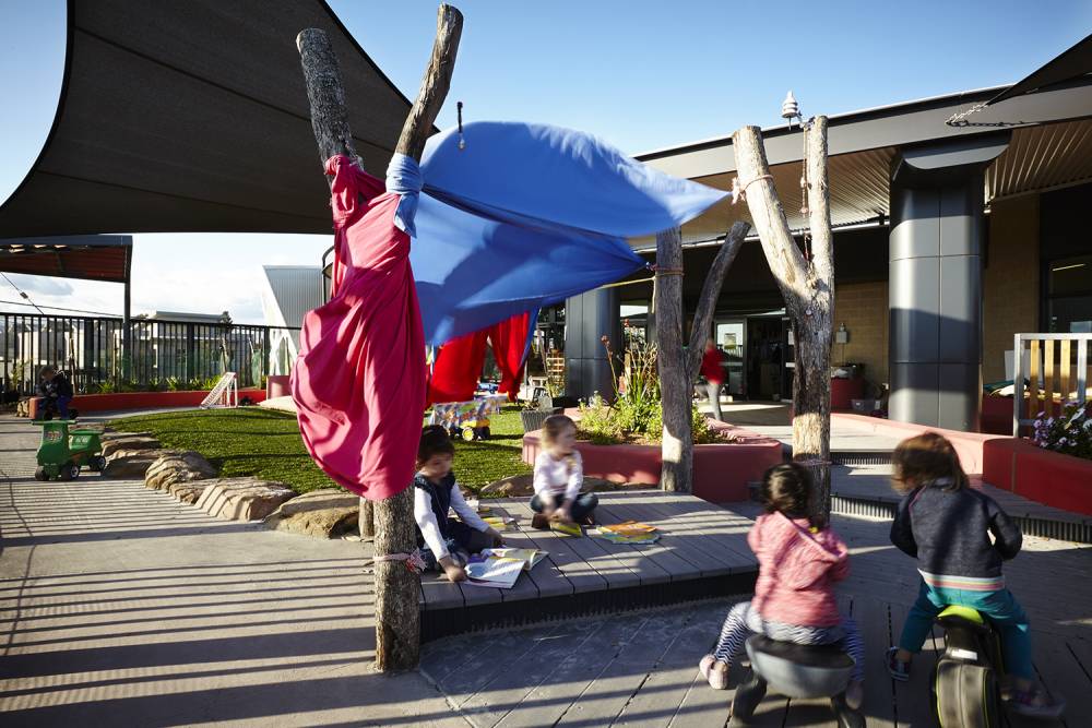 Temporary fabric provides a shady space to play
