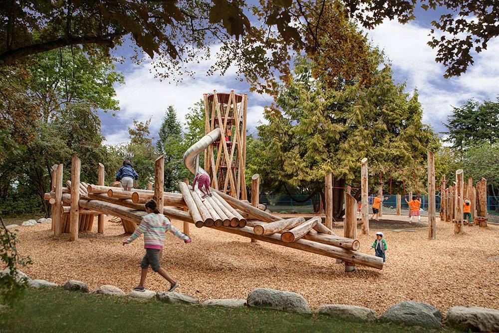 Peeled logs are incorporated into all of the elements at this adventurous play area