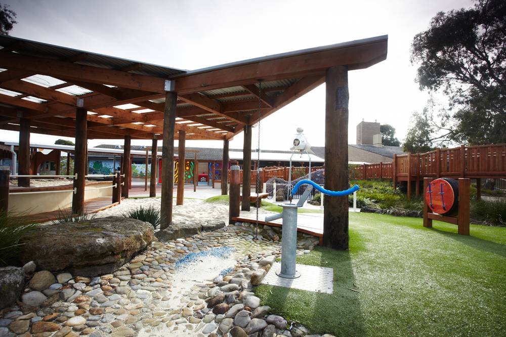 Weather shelter provides shade and directs runoff to "stream" below