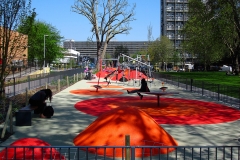 Play area with bright poured rubber mounds