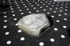 Embedded boulder with polka dot asphalt at Paul-Bruchesi Primary School