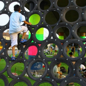 Repurposed tires used to make a climbing structure