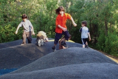 Playing among the poured rubber mounds