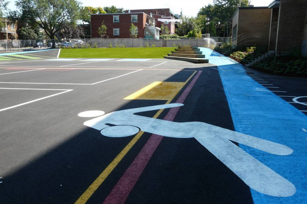 Painted asphalt with grass slope beyond
