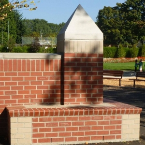 Wall with inscribed legacy bricks